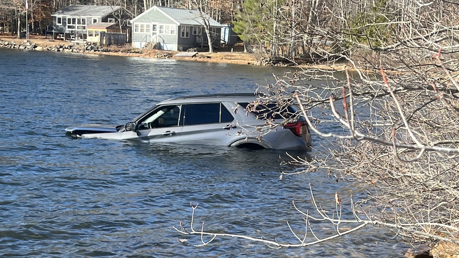 SUV crashes into Maine pond after driver swerves to avoid oncoming vehicle