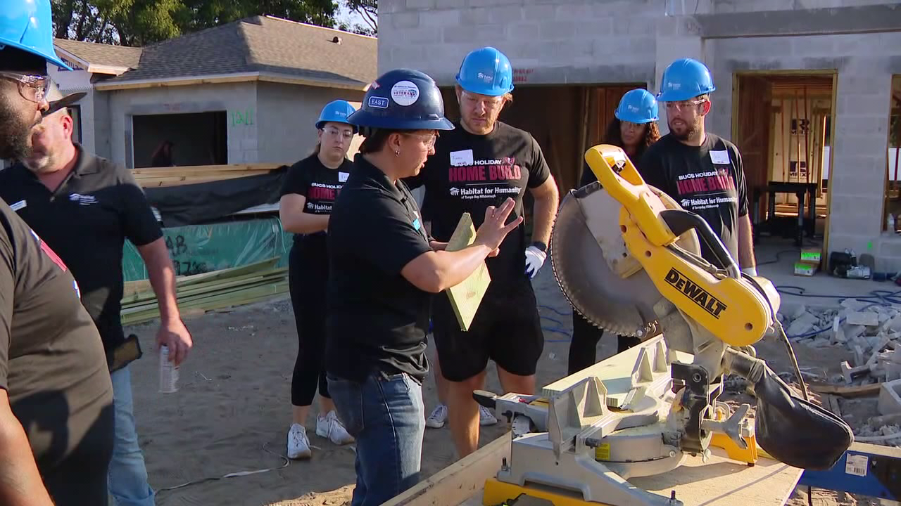 Bucs give back building homes through