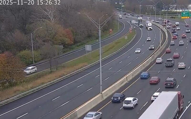 WATCH: Dump truck hits overhead sign on I-70