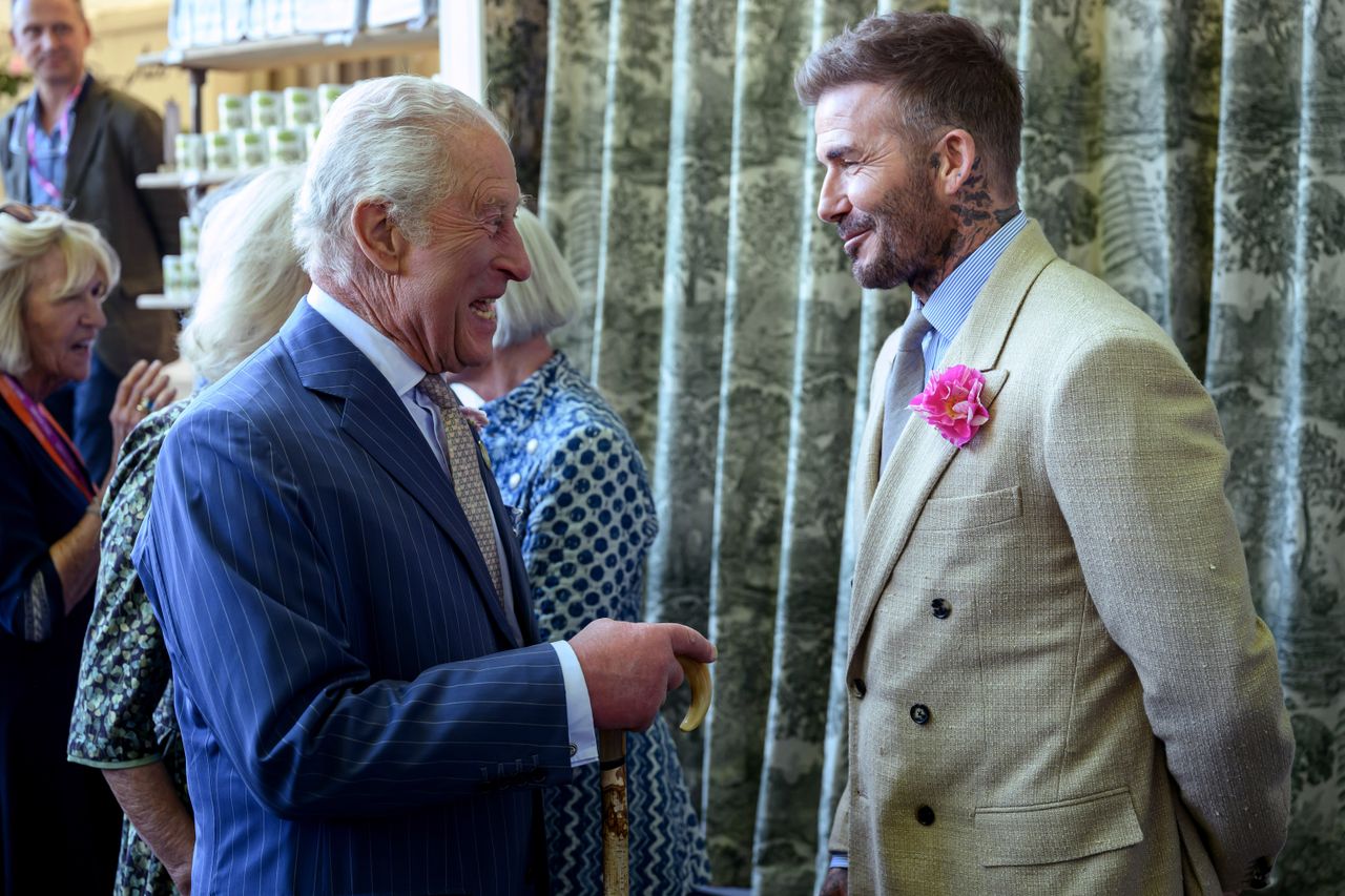 Getty Images King Charles III and Sir David Beckham at the 2025 Chelsea Flower Show.