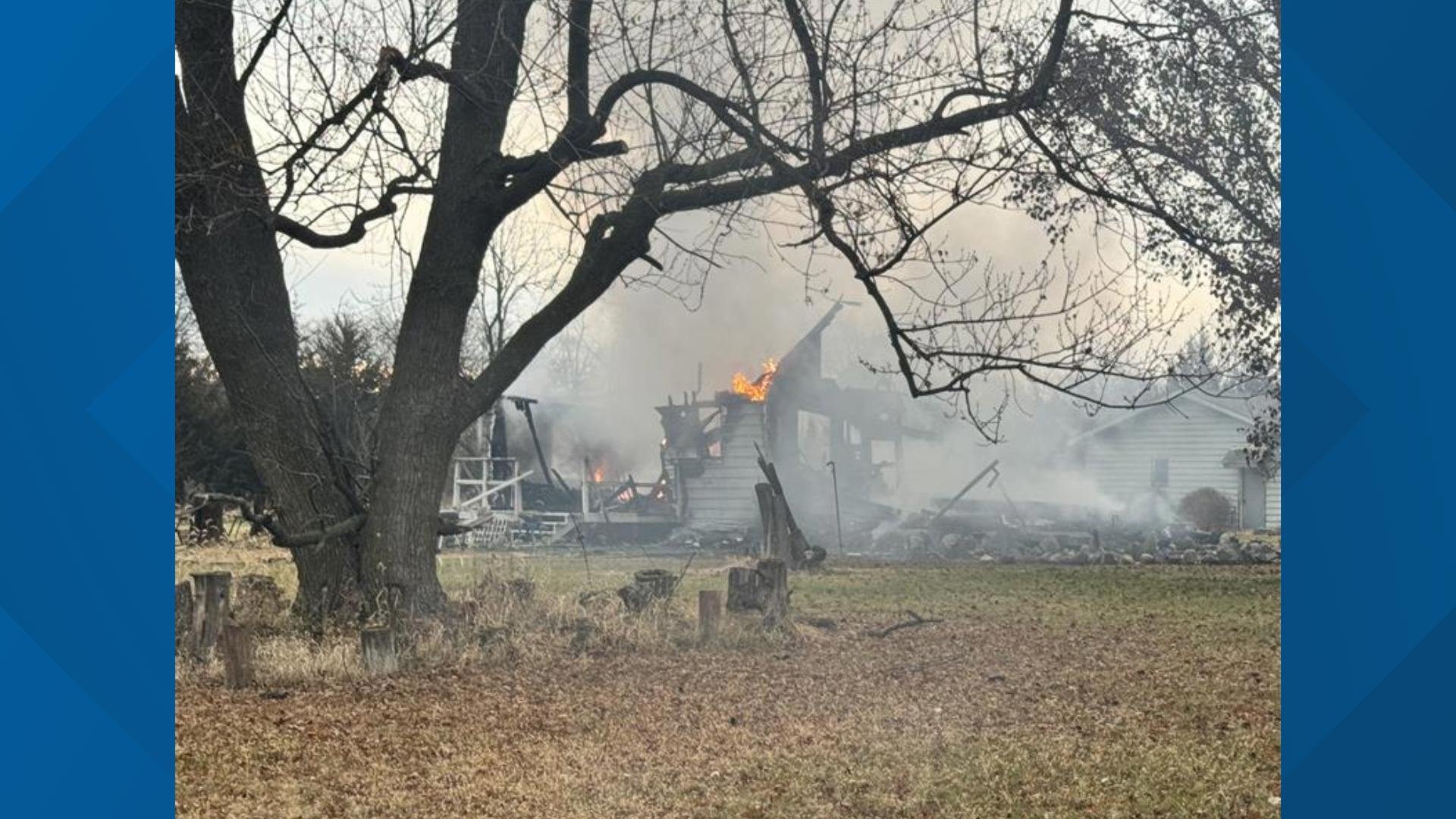 Early morning fire in Woodward partially collapses home