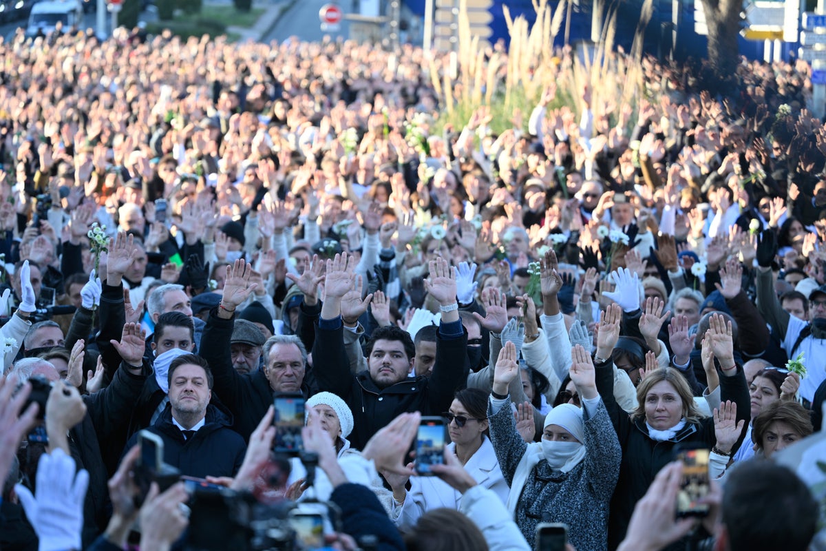 Thousands march in Marseille after killing shocks France