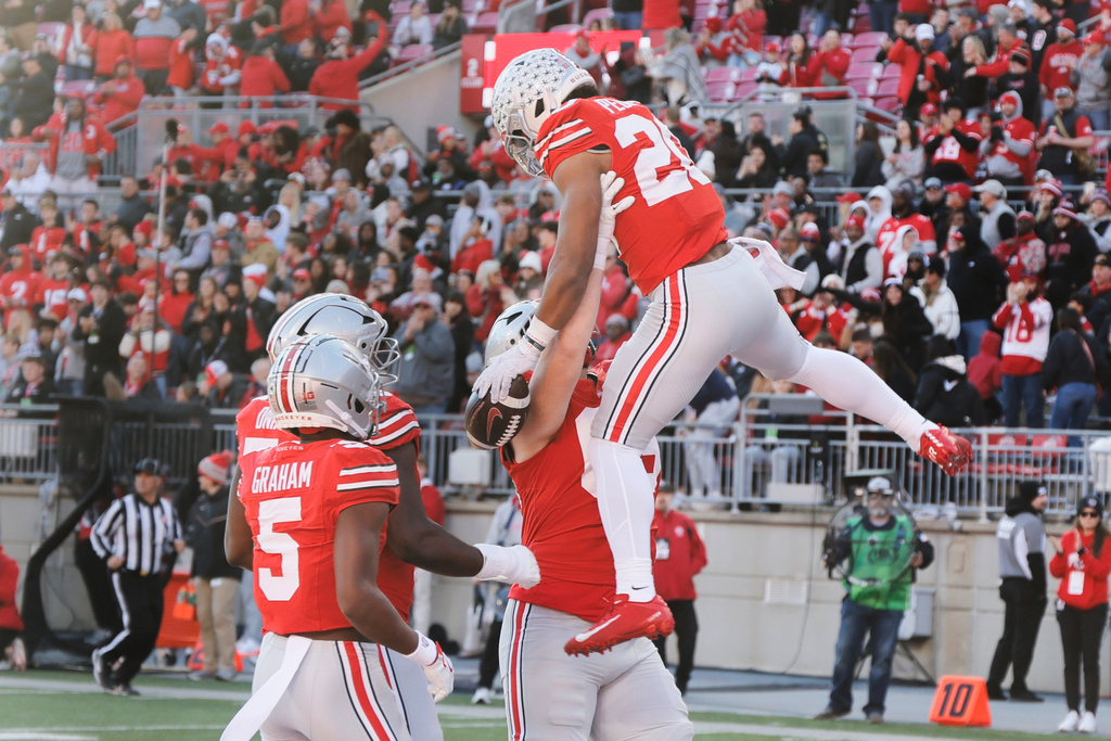 Top-ranked Ohio State pulls away in 2nd half for 42-9 victory over ...