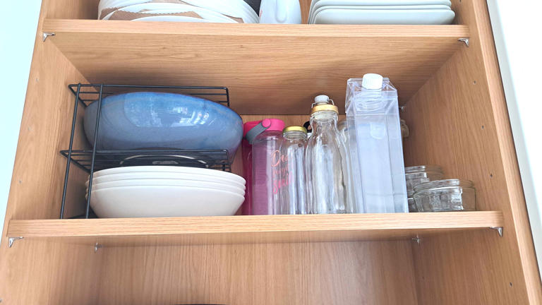 This $15 item solved my cabinet clutter — and it's a game-changer for ...