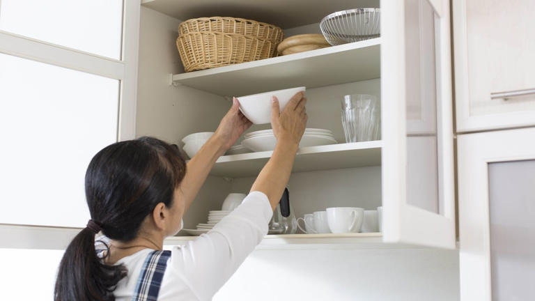 This $15 item solved my cabinet clutter — and it's a game-changer for ...