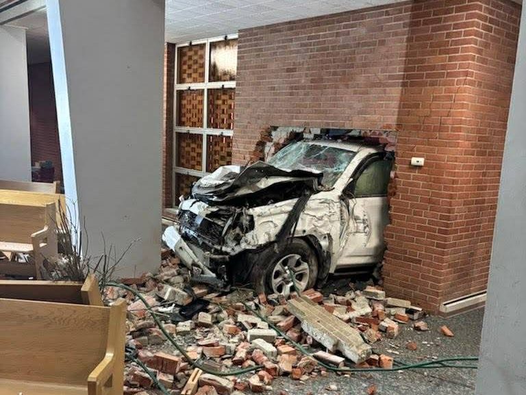 Car crashes through St. Ambrose church wall, RPD investigating