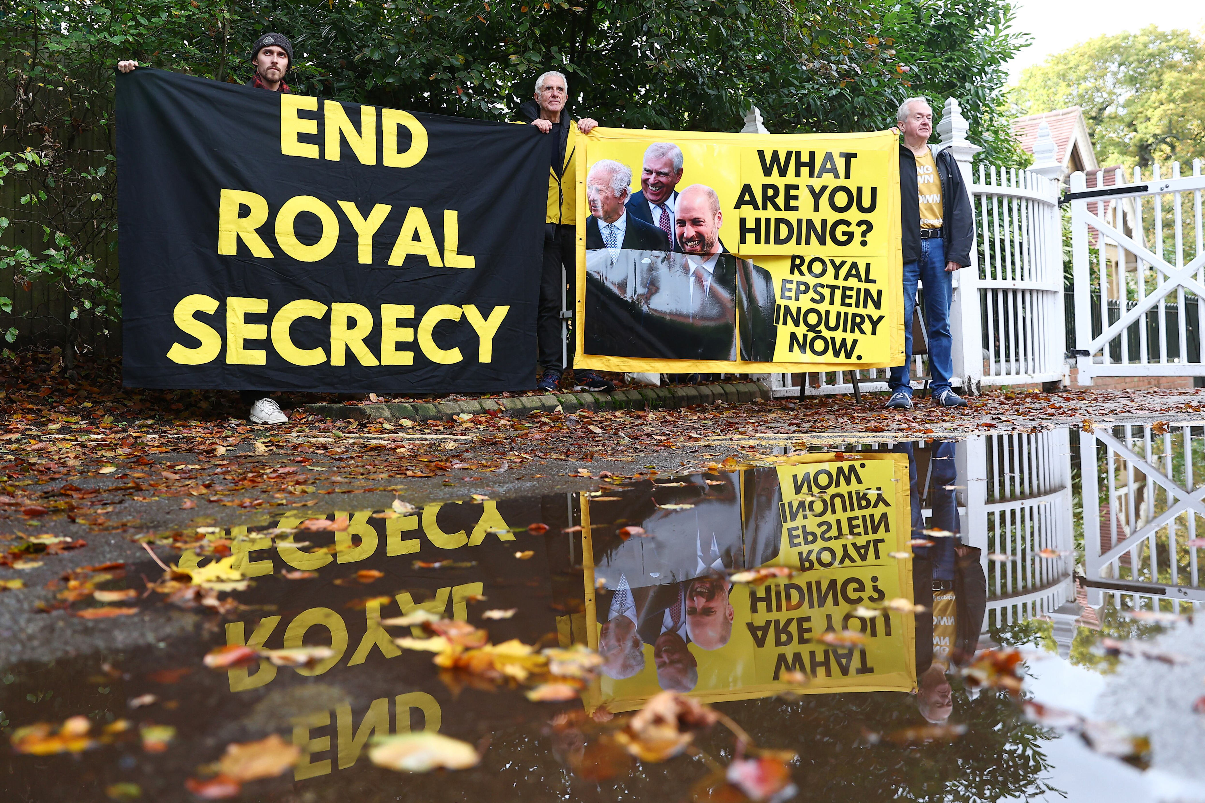 Activists stage a protest at the entrance to Windsor Great Park and Royal Lodge, then the home of Andrew Mountbatten-Windsor, on Oct. 21, 2025. / Peter Nicholls / Getty Images