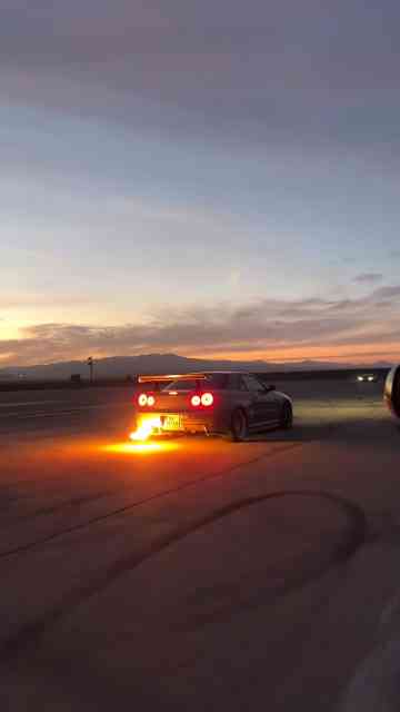 Nissan R34 GTR at Sunset – Stunning Visuals & Vibes!