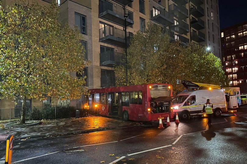 Multiple injured after bus smashes into block of flats as people rushed ...