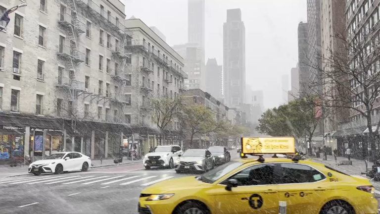 New York City sees first snow of the season after cold November air ...