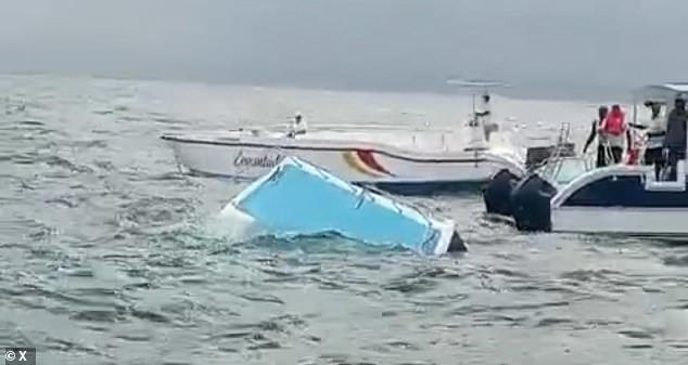 Moment cruise passengers are rescued from the sea after catamaran sinks ...