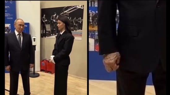 Vladimir Putin's 'swollen and sore' hand at public event sparks health ...