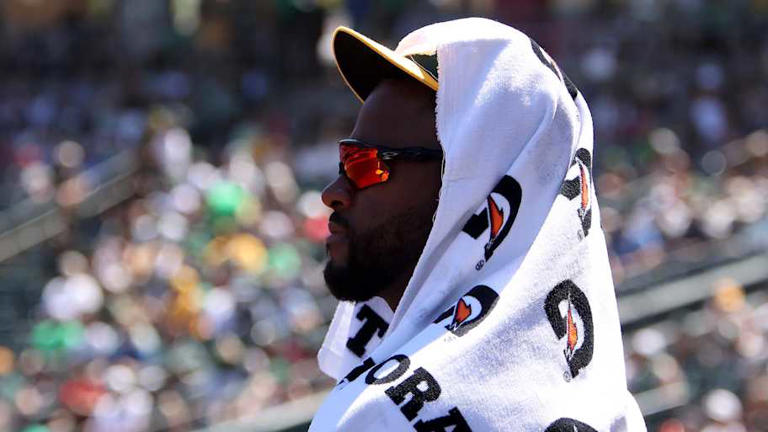 Aug 3, 2025; West Sacramento, California, USA; Athletics pitcher Luis Severino (40) watches the game against the Arizona Diamondbacks during the fifth inning at Sutter Health Park. Mandatory Credit: Dennis Lee-Imagn Images | Dennis Lee-Imagn Images