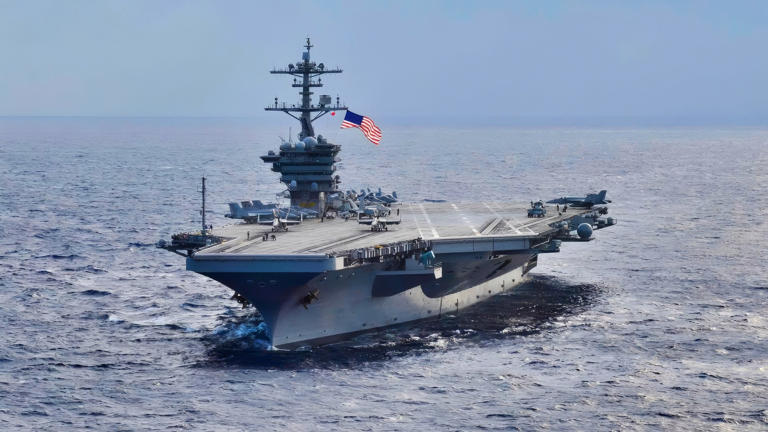 Navy Aircraft Carrier At Sea. Image Credit: Creative Commons.