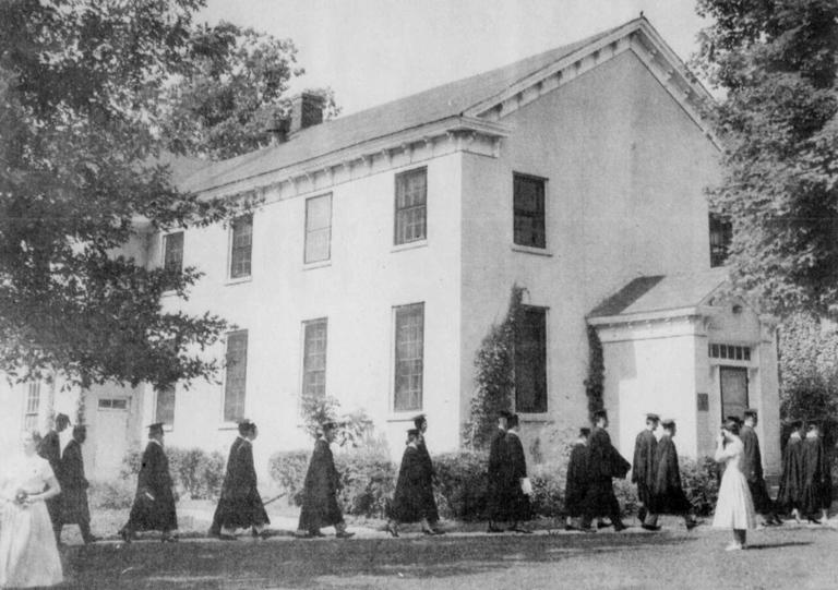 Shurtleff College grads march past Loomis Hall in 1950s