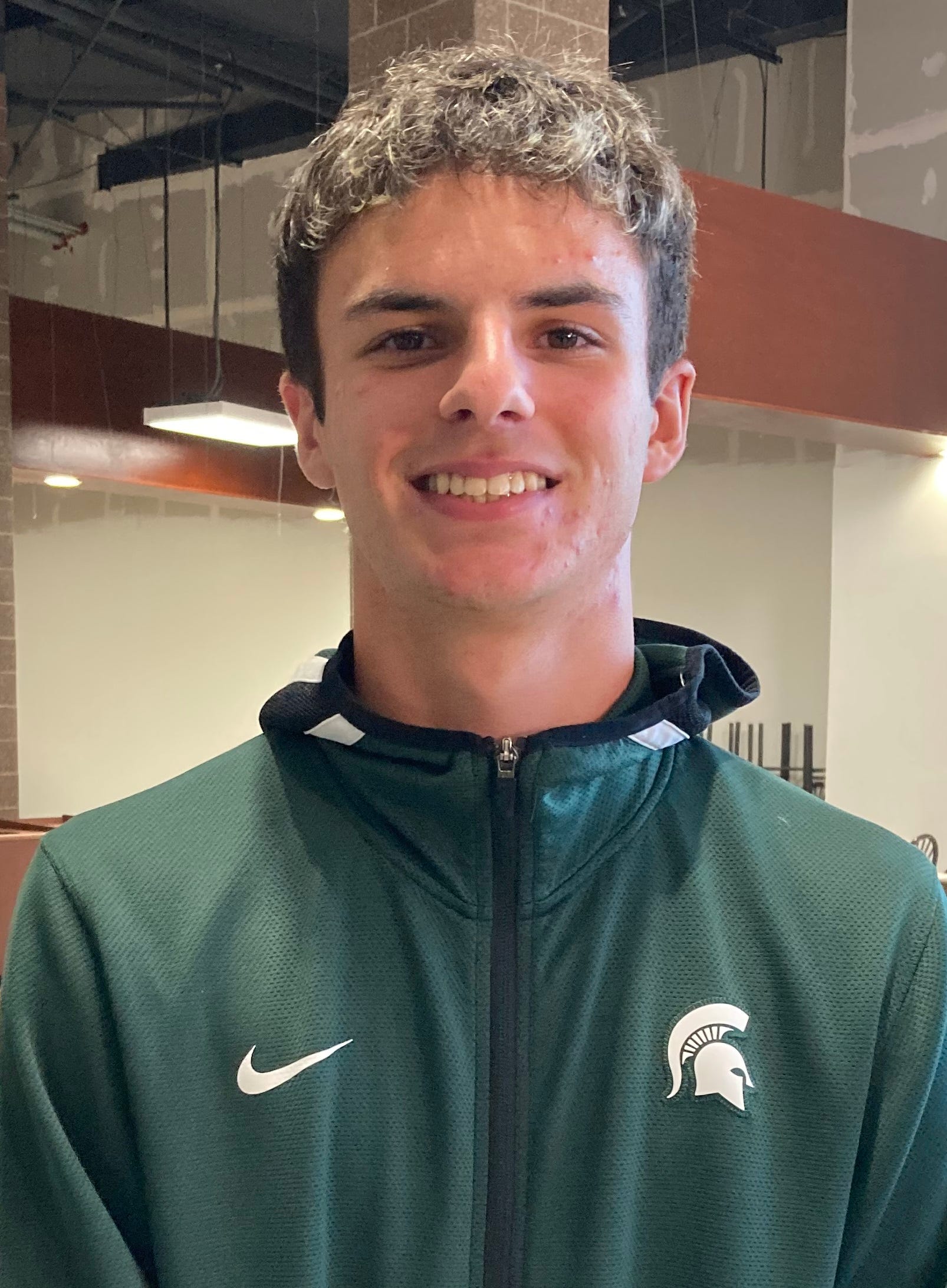 East Lansing's Drew Rensing reaches dream, signs to play for father ...