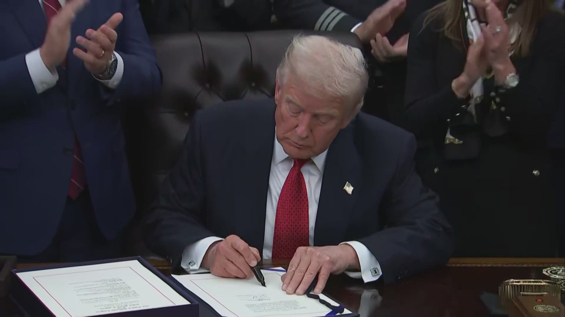 Watch: President Trump signs bill ending government shutdown
