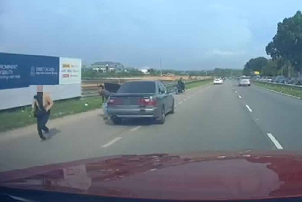 Woman jumps from moving car to escape abusive husband
