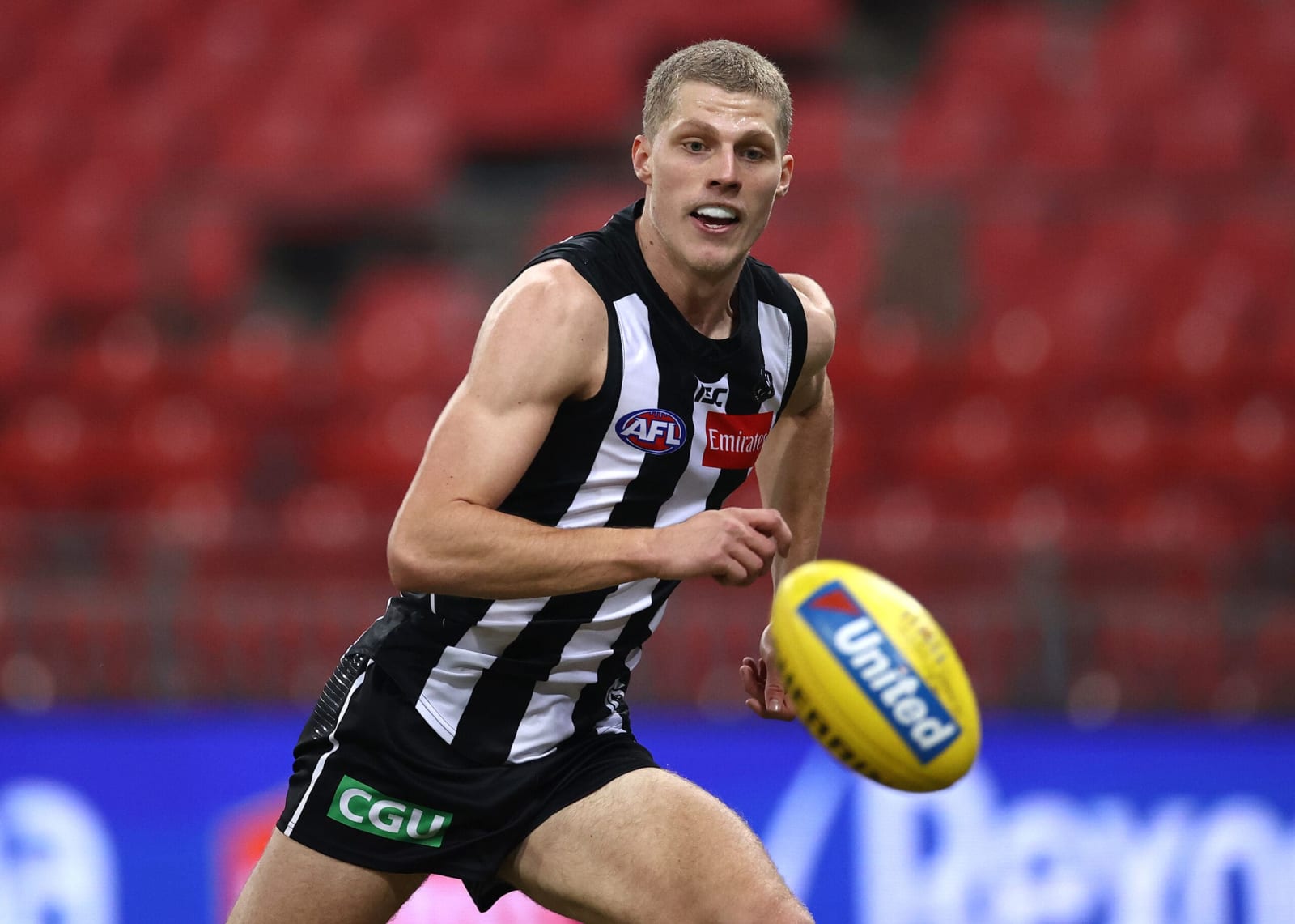 Local club claims former Collingwood midfielder