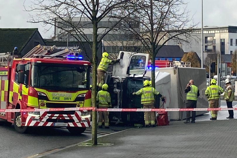 Lucky escape for lorry driver as truck overturns onto footpath in Cork city