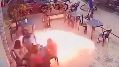 cigarette gas station explosion Exploding e-cigarette sparks concern Flames rise from a car