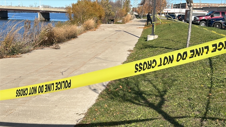 Police release more details about body pulled from Grand River