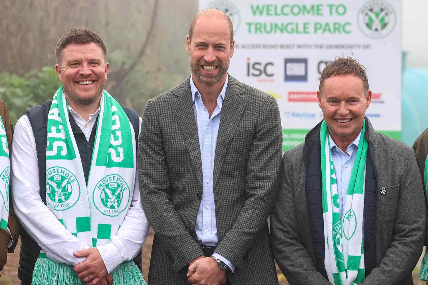 Andrew Parsons / Kensington Palace Prince William, center, with members of Mousehold AFC on Nov. 13, 2025