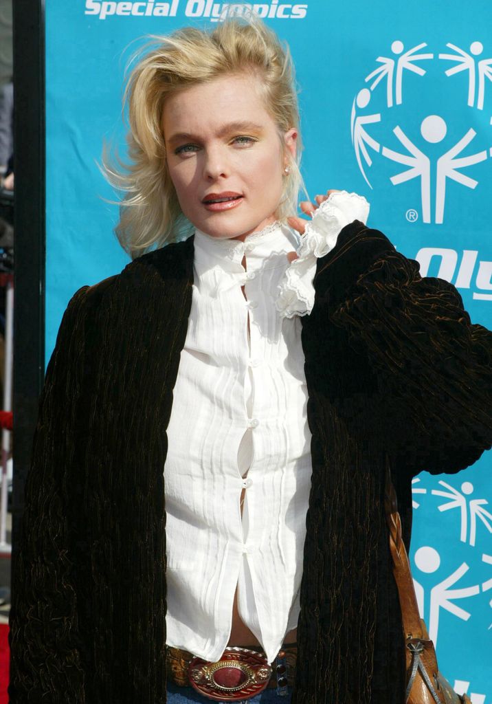Baywatch's Erika Eleniak now sports alternative look to swimsuit clad