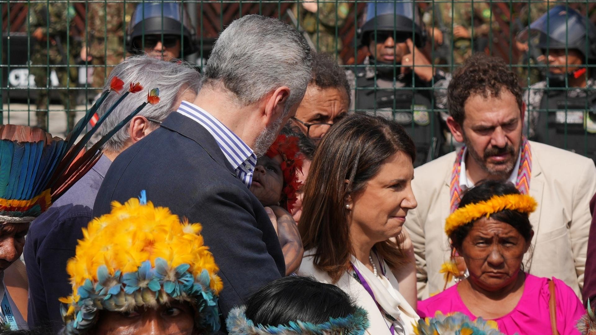 UN climate talks president holds baby during Indigenous people's ...