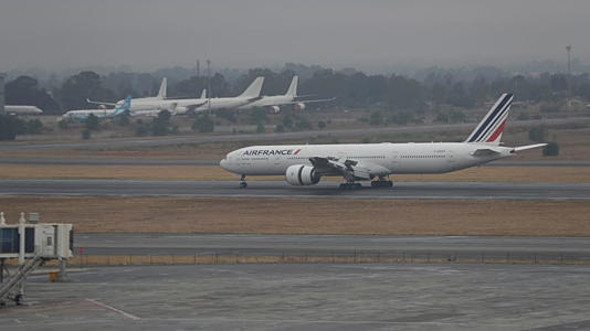 FILE -An Air France plane lands at the International O.R. Tambo Airport in Johannesburg, Oct. 1, 2020.