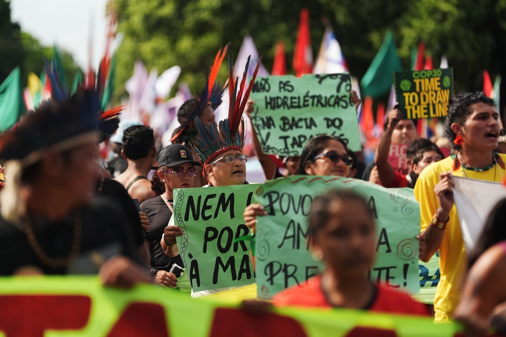 Climate protesters march on COP30 with costumes and drums demanding to be heard