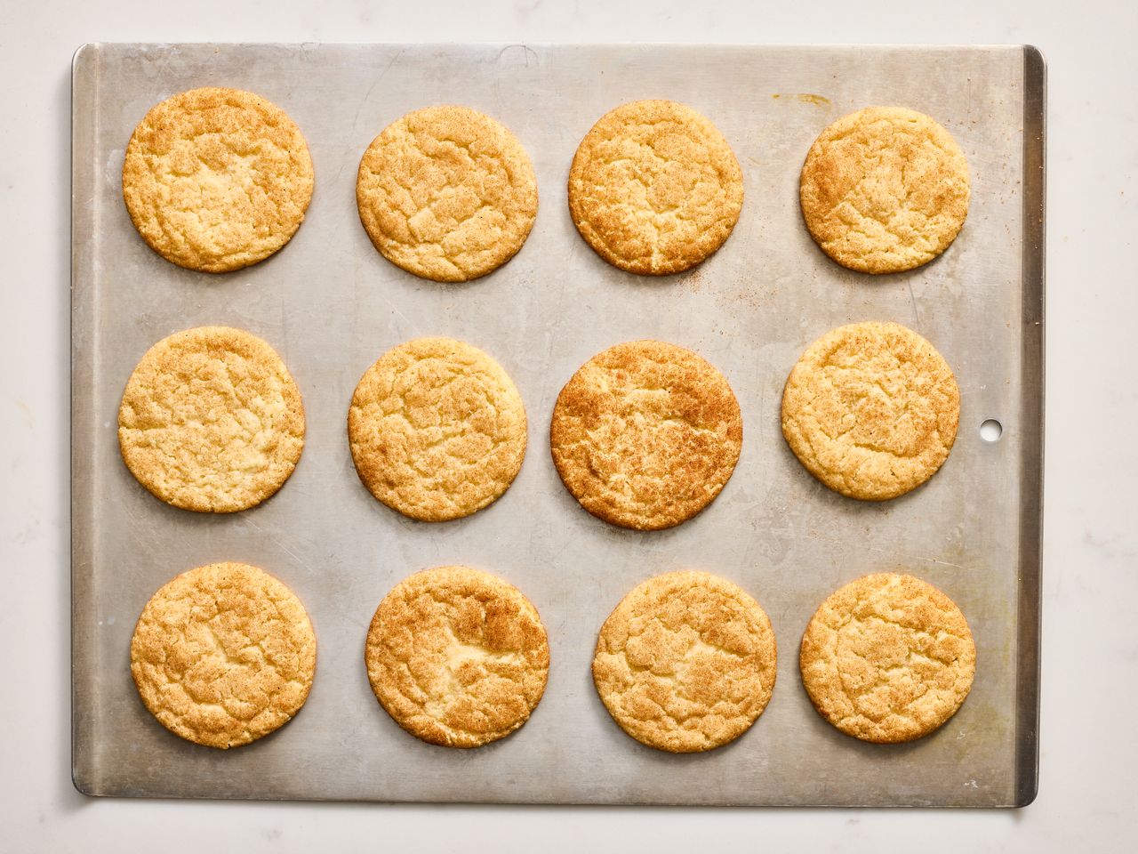 Mrs. Sigg's Snickerdoodles cookies on a baking sheet