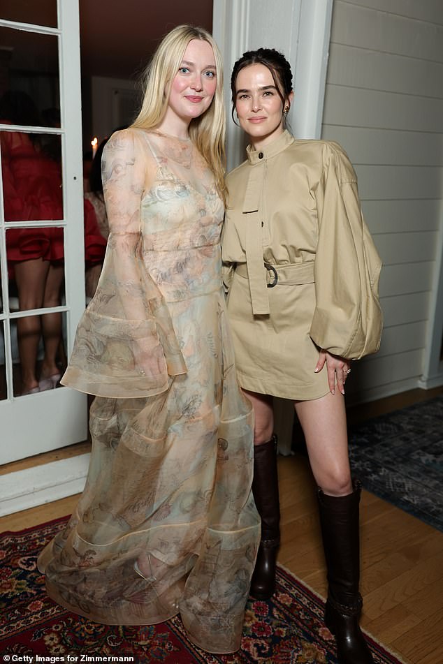 Rita Ora flashes abs in quirky dress as she joins elegant Dakota ...