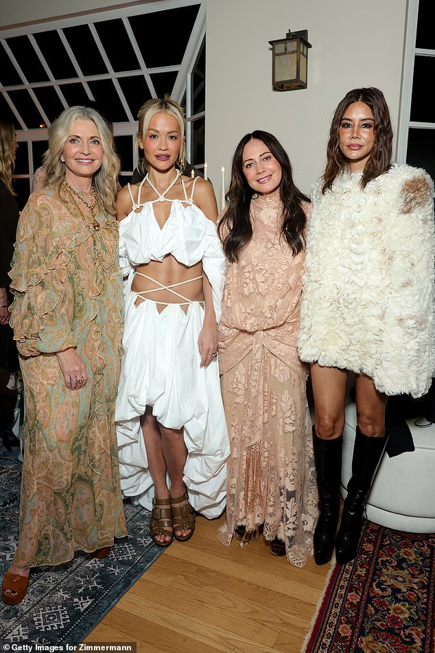 Rita Ora flashes abs in quirky dress as she joins elegant Dakota ...