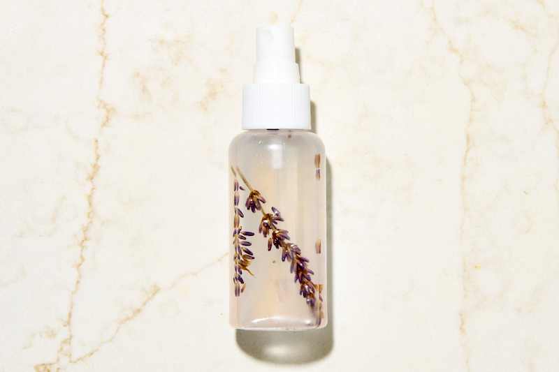 overhead shot of the diy room spray all finished on a marble surface