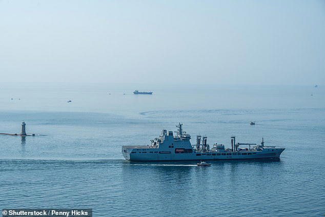 Search for a missing UK Navy crew member who fell from support vessel ...