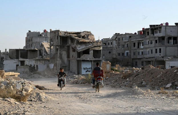 Destroyed buildings in Darayya on the outskirts of Damascus (Photo: Louai Beshara/AFP)