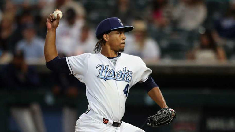 Hooks pitcher Miguel Ullola throws a pitch on Opening Night at Whataburger Field on Friday, April 5, 2024, in Corpus Christi, Texas. | Angela Piazza/Caller-Times / USA TODAY NETWORK