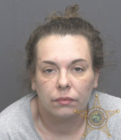 Woman charged with neglect after crash with child in car