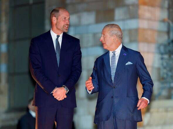King Charles and William chatting and laughing