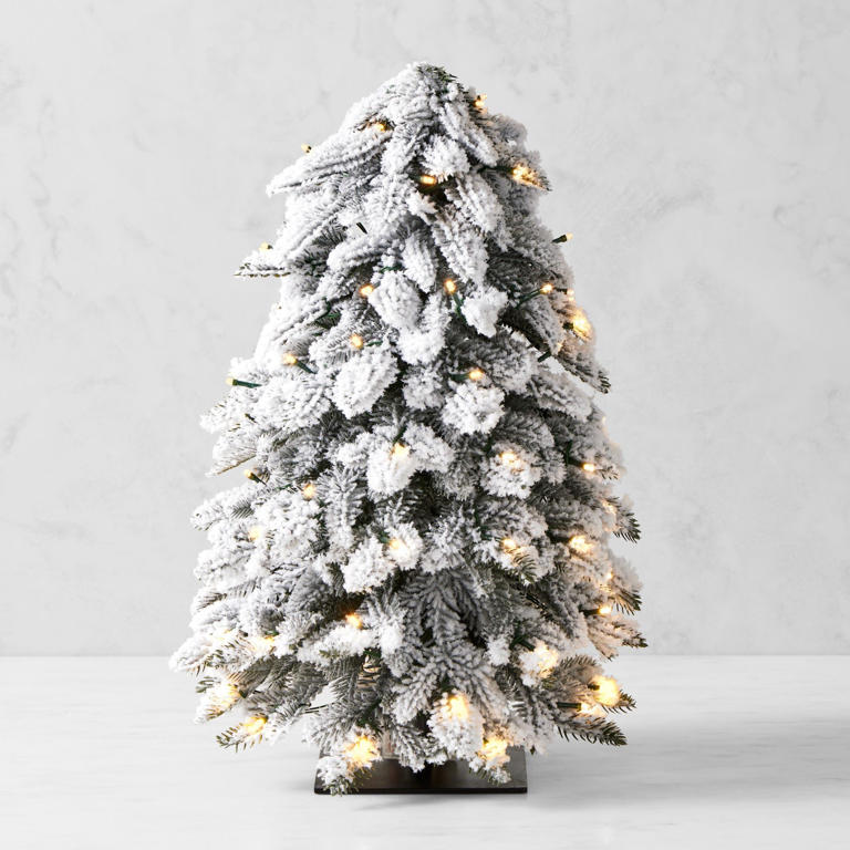 Frosted pre-lit mini tree with black base