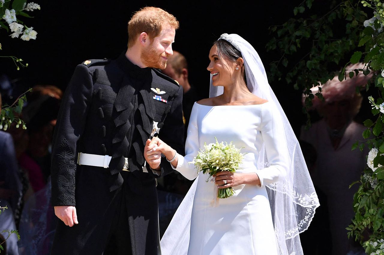 BEN STANSALL/POOL/AFP/AFP via Getty Prince Harry and Meghan Markle at their 2018 wedding