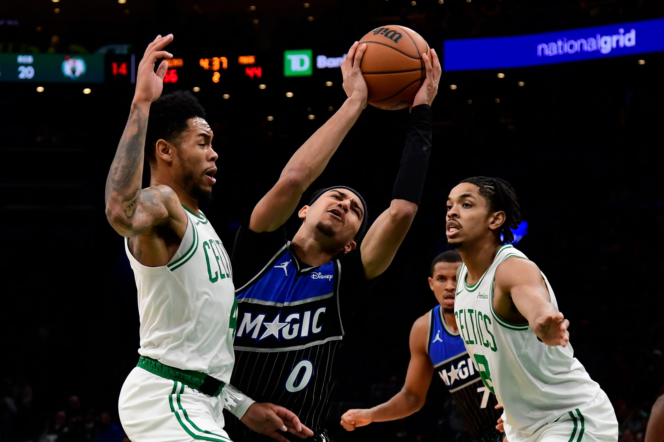Boston Celtics escape late Orlando Magic push, win 138-129 (PHOTOS)