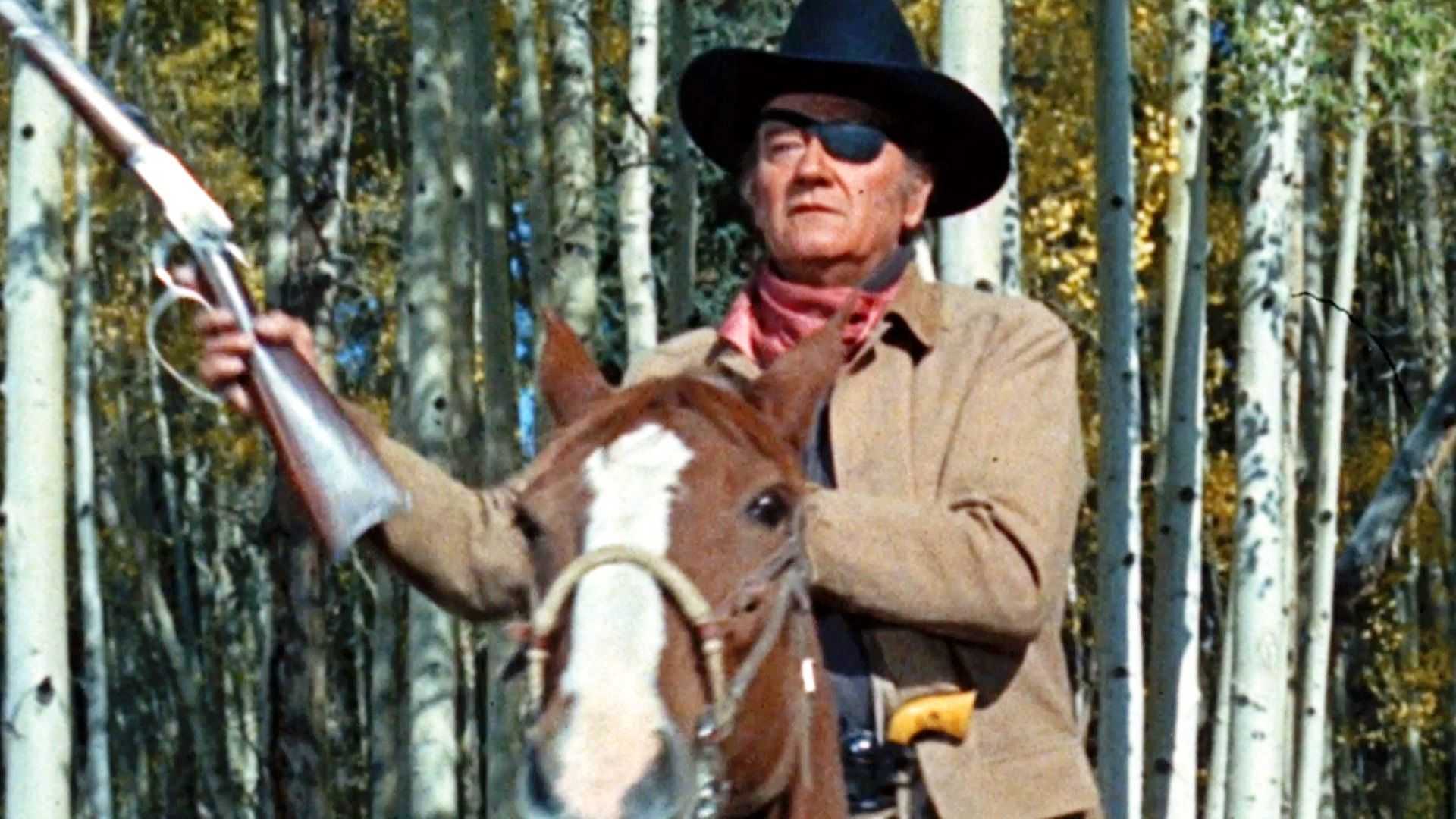 John Wayne as Rooster Cogburn in True Grit