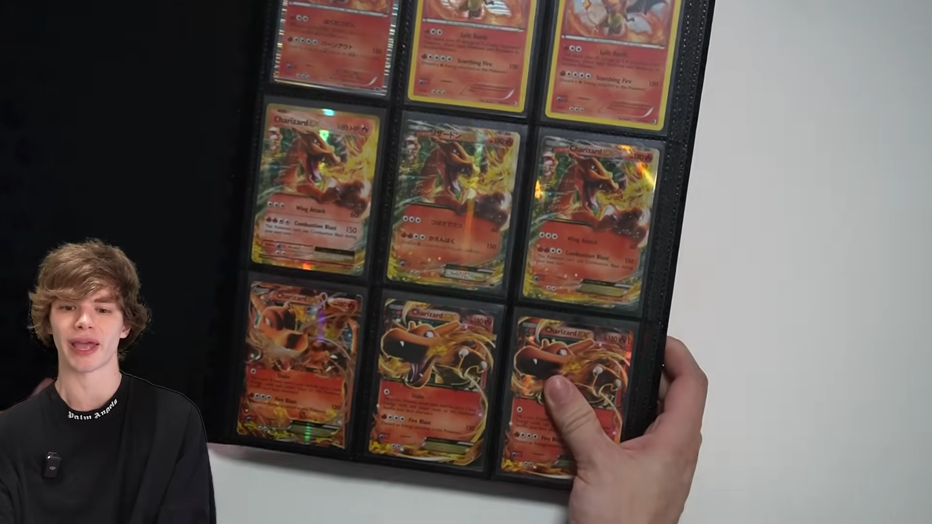A collector walks through a $30,000 Charizard Pokémon card collection