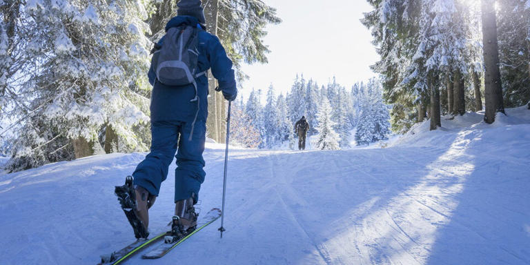 Skitourengeher auf Piste