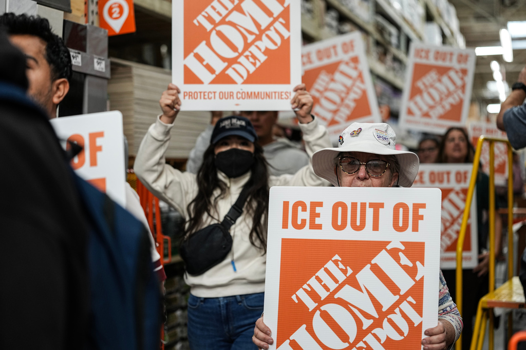 Protesters stage ‘buy in’ at Home Depot stores over its cooperation ...
