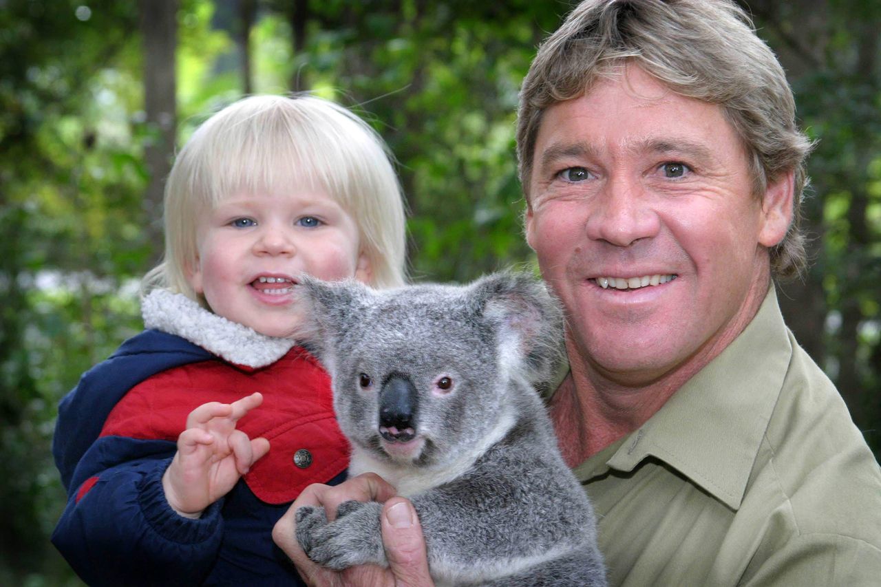 'Crocodile Hunter' Steve Irwin with his son, Robert Irwin, and a Koala at Australia Zoo.