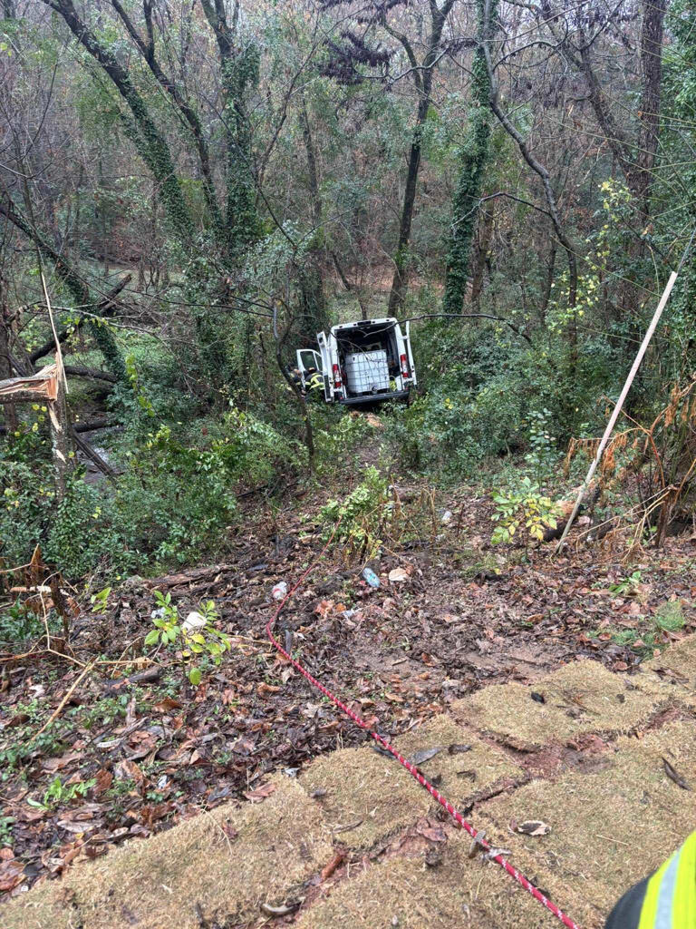 First responders use ropes to rescue driver down embankment in Homewood