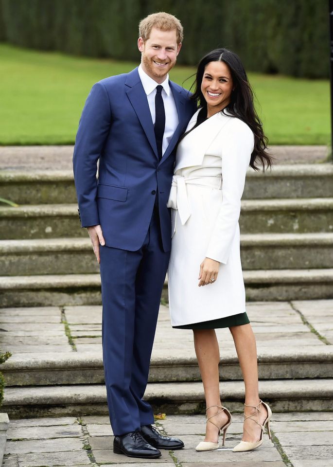 Samir Hussein/WireImage Prince Harry and Meghan Markle at the photocall in the Sunken Gardens of Kensington Palace on Nov. 27, 2017.